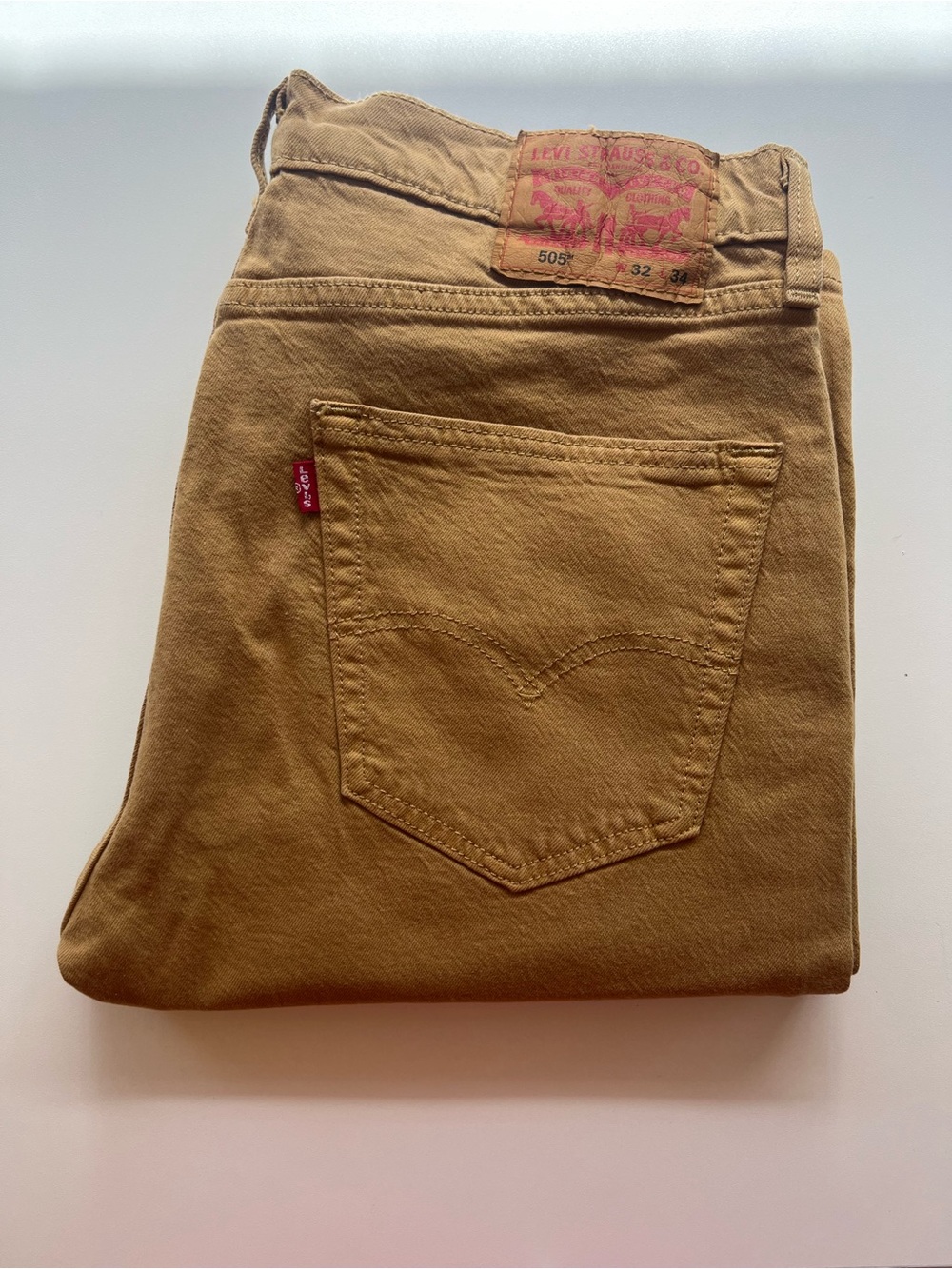Levi's tan workwear-style jeans